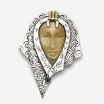 Zealandia Pendant Brooch, Woman wearing a head scarf, Sterling Silver and carved fossil tusk.