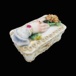 Antique Victorian trinket box hand offering flowers by S&S Limoges.