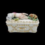 Antique Victorian trinket box hand offering flowers by S&S Limoges.