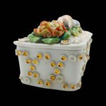 Antique Victorian trinket box hand offering flowers by S&S Limoges.