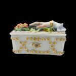 Antique Victorian trinket box hand offering flowers by S&S Limoges.