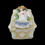 Antique Victorian trinket box hand offering flowers by S&S Limoges.