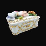 Antique Victorian trinket box hand offering flowers by S&S Limoges.