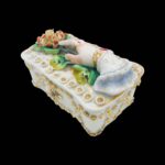 Antique Victorian trinket box hand offering flowers by S&S Limoges.
