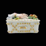 Antique Victorian trinket box hand offering flowers by S&S Limoges.