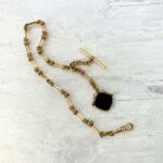 Antique Victorian chunky pocket watch chain with intaglio fob.