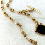 Antique Victorian chunky pocket watch chain with intaglio fob.