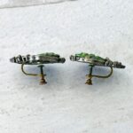 Vintage hand carved turquoise bird earrings in silver plated settings with screw back closures