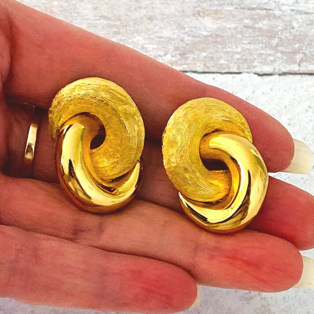Christian Dior interlocking earrings with post back for pierced ears.