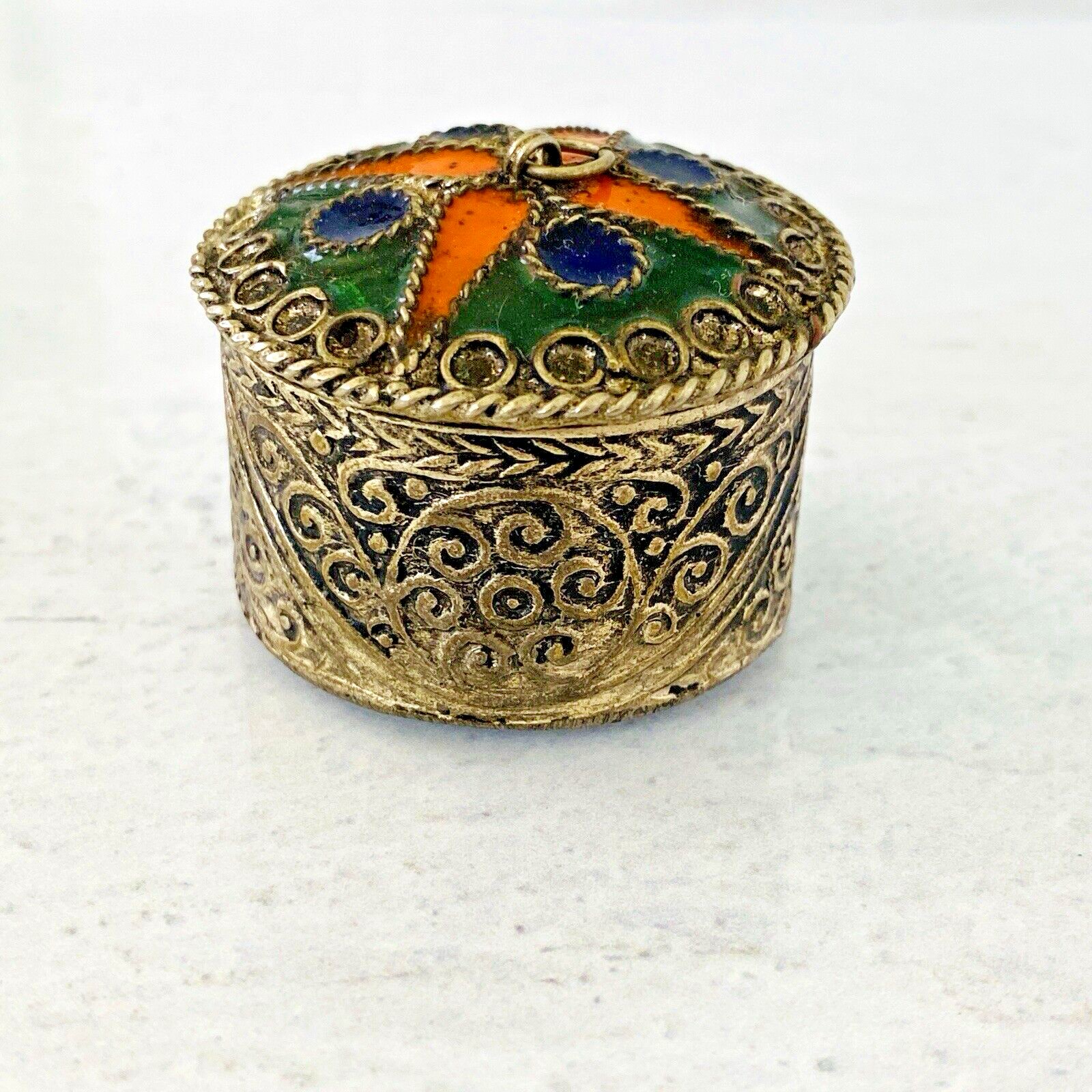 Stamped Metal Enamel White Brass Pill Box Pendant Trinket Ring Round Silver Tone