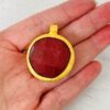 Large Faceted Ruby Quartz Disk Gold Elecroplated Frame Pendant