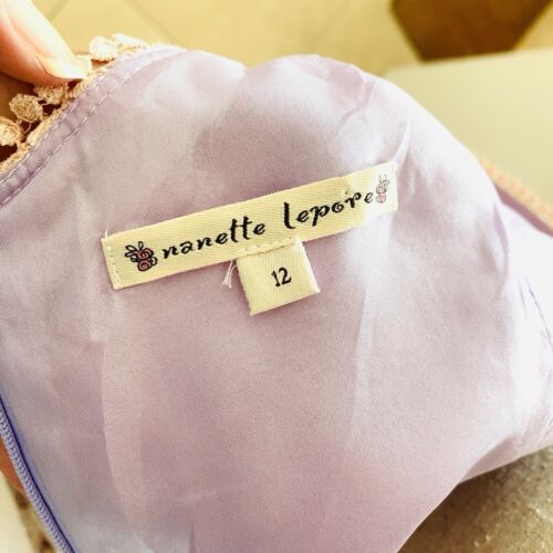 A feminine and lacy vintage Nanette Lepore dress.