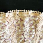 A feminine and lacy vintage Nanette Lepore dress.