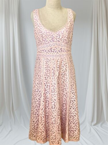 A feminine and lacy vintage Nanette Lepore dress.