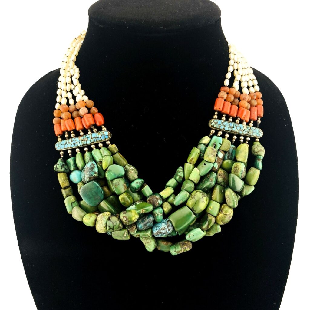 Vintage Tibetan silver necklace featuring turquoise, Coral, baroque pearls, and Carnelian