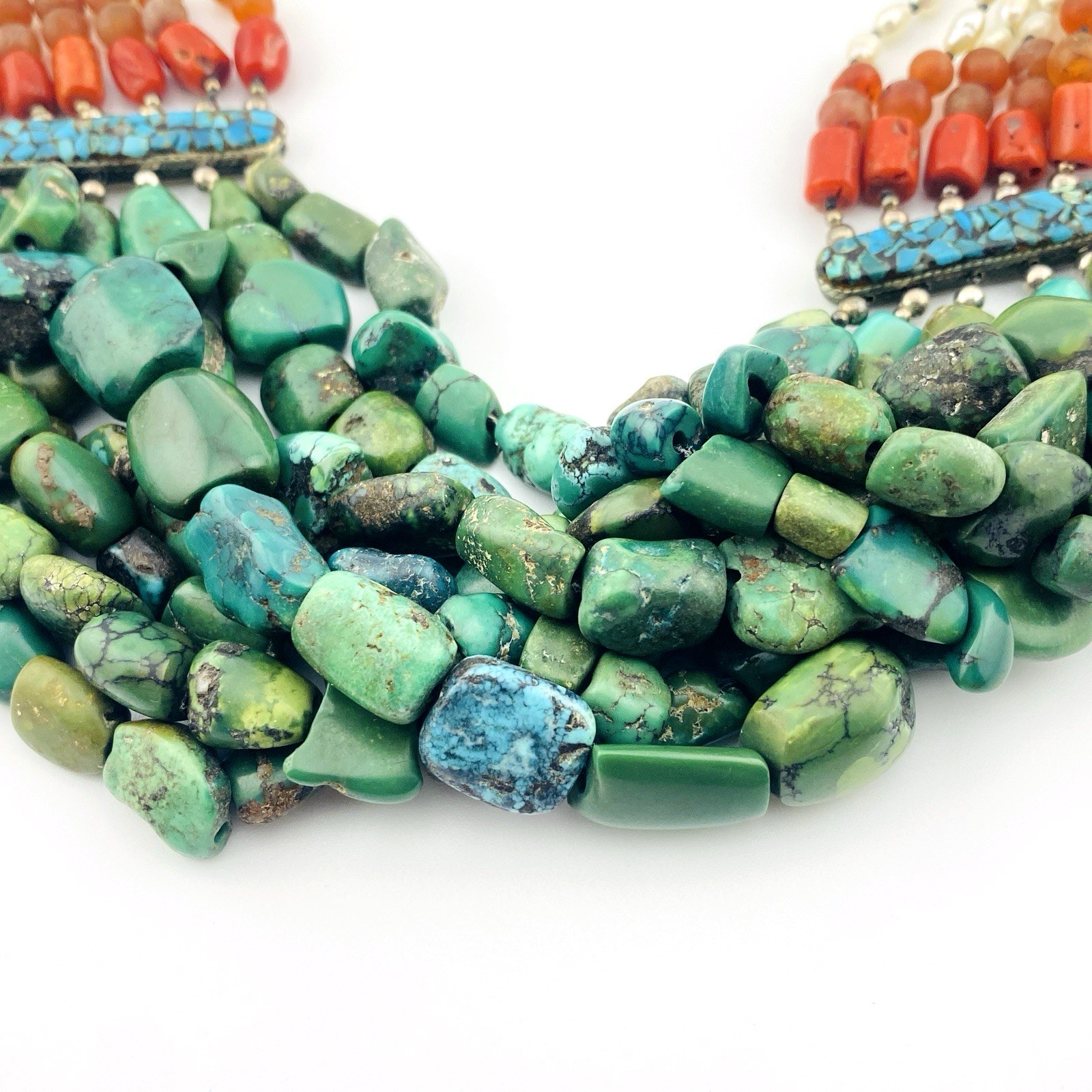 Vintage Tibetan silver necklace featuring turquoise, Coral, baroque pearls, and Carnelian