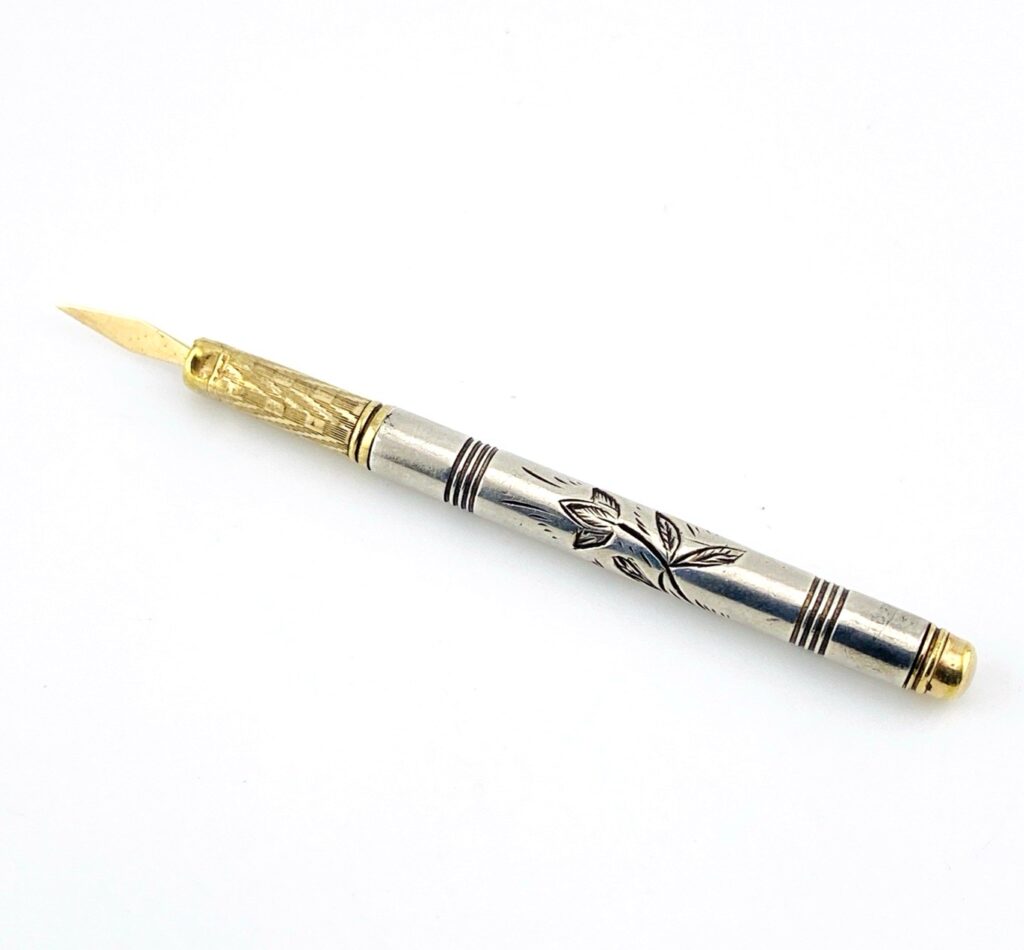 Victorian Sterling Silver and 10k Gold Retractable Toothpick