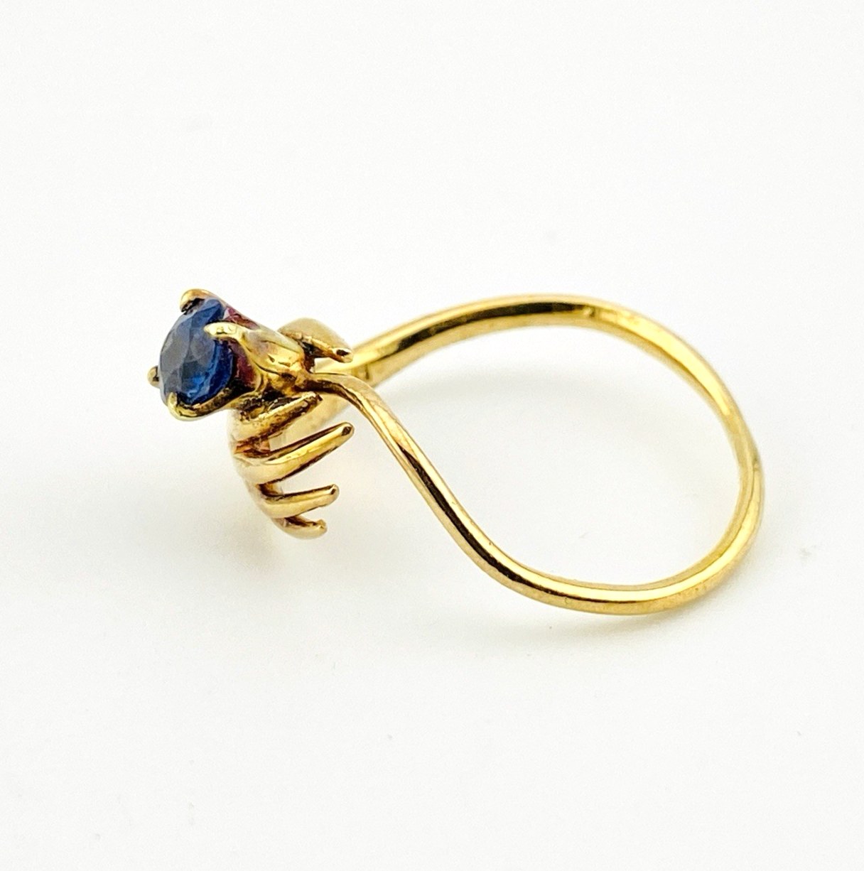 Hand Offering a Sapphire 14k Gold Ring