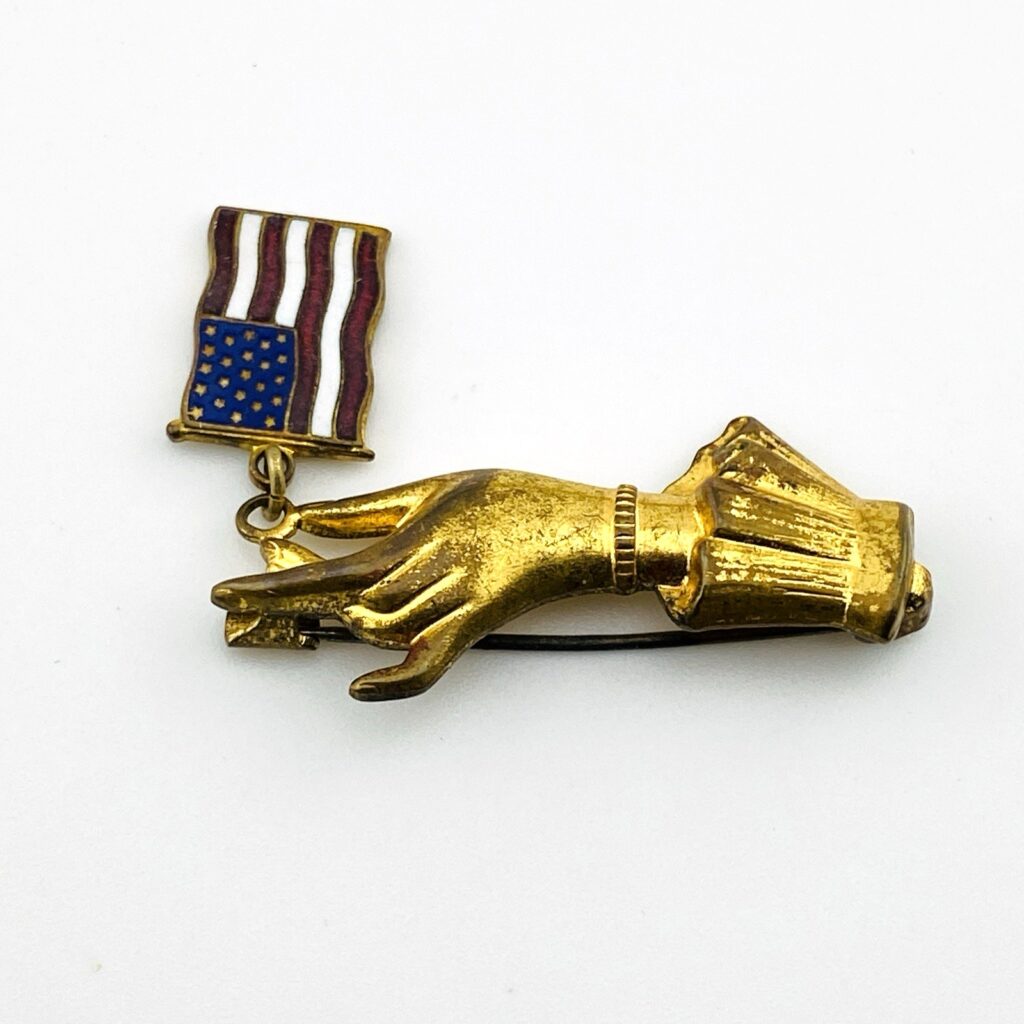 Antique Victorian-Style Hand Holding American Flag Brooch Pin