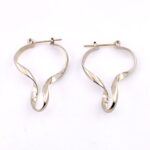 Asymmetrical Twist Silver Tone Hoop Earrings - Modernist Design