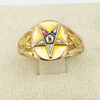 Front view of a vintage Eastern Star Masonic signet ring showing multicolor enamel star detail