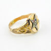 Side view of a vintage Eastern Star Masonic signet ring showing multicolor enamel star detail
