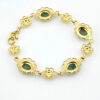 Vintage 12k gold filled bracelet with oval green Connemara marble stones set in decorative filigree and floral links