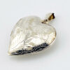 Large engraved sterling silver puffy heart locket pendant that opens to hold two photographs