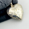 Large engraved sterling silver puffy heart locket pendant that opens to hold two photographs