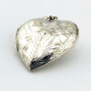 Large engraved sterling silver puffy heart locket pendant that opens to hold two photographs