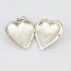 Large engraved sterling silver puffy heart locket pendant that opens to hold two photographs