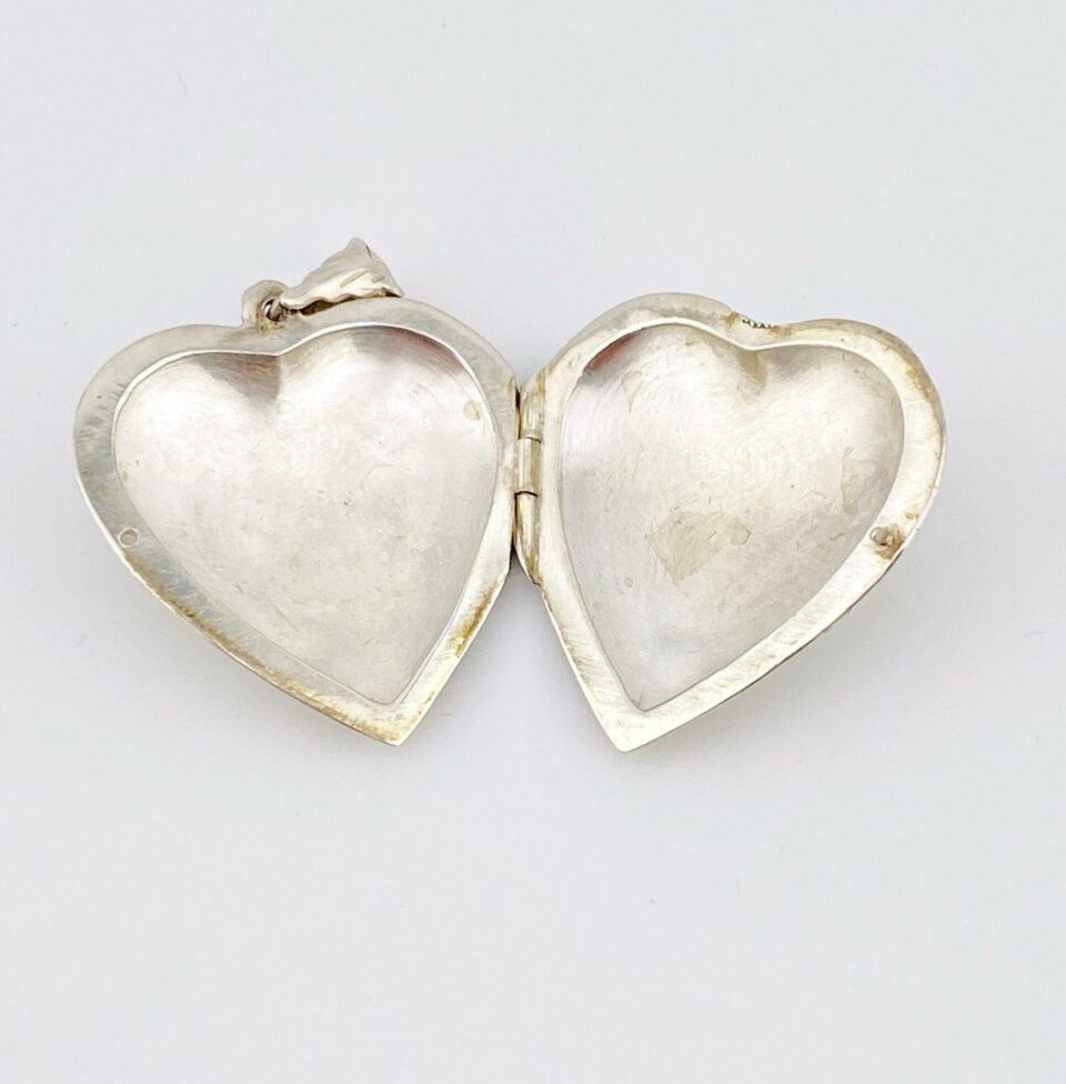 Large engraved sterling silver puffy heart locket pendant that opens to hold two photographs