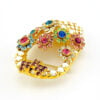 Signed Dorothy Bauer vintage gold tone flower basket brooch with pastel Swarovski crystals and red bow detail