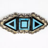Sterling silver Southwestern brooch with geometric turquoise and black onyx inlay and stamped silver border