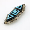 Sterling silver Southwestern brooch with geometric turquoise and black onyx inlay and stamped silver border