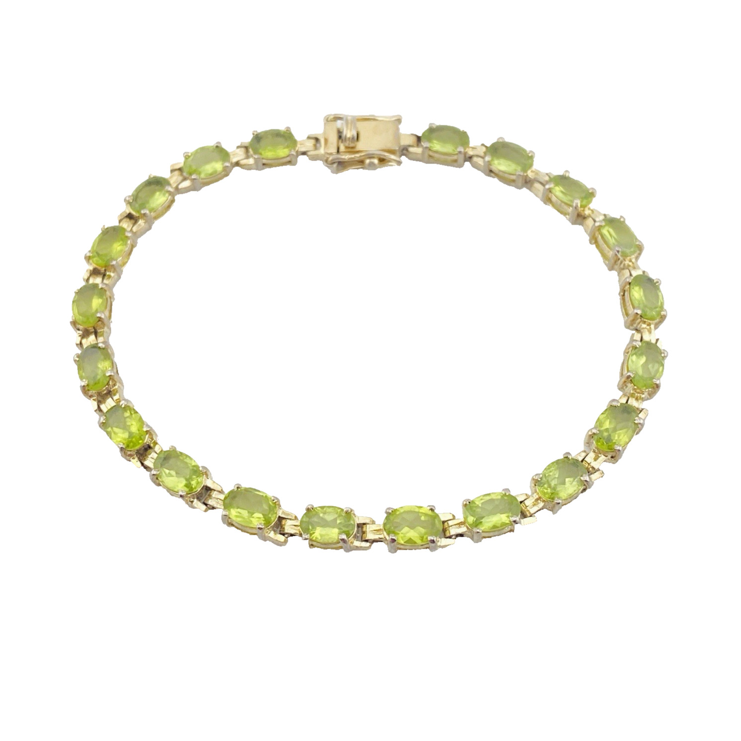 Vintage gold over sterling silver line bracelet with twenty oval faceted peridot gemstones arranged in a continuous row