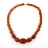Antique Art Deco amber necklace with matte faceted graduated beads