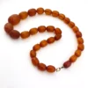 Antique Art Deco amber necklace with matte faceted graduated beads