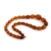 Antique Art Deco amber necklace with matte faceted graduated beads
