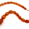 Antique Art Deco amber necklace with matte faceted graduated beads