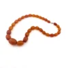 Antique Art Deco amber necklace with matte faceted graduated beads