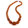 Antique Art Deco amber necklace with matte faceted graduated beads