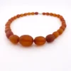 Antique Art Deco amber necklace with matte faceted graduated beads