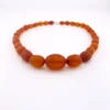 Antique Art Deco amber necklace with matte faceted graduated beads