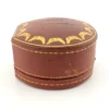 Antique Cartier leather jewelry presentation box with gilded garland border and silk velvet interior