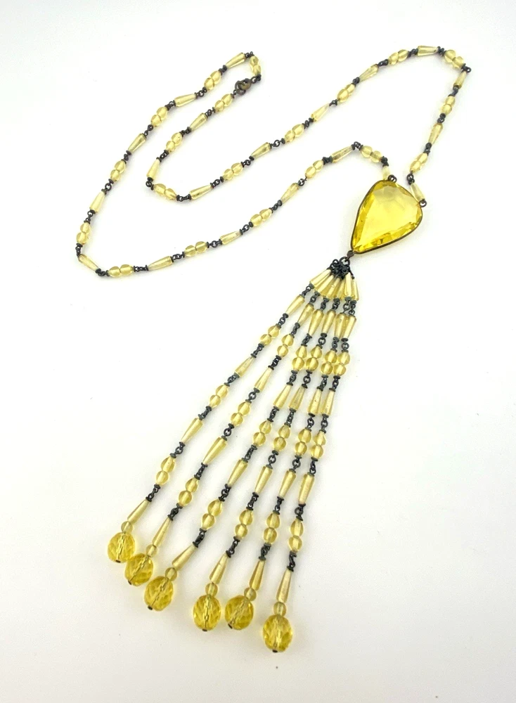 Antique uranium glass flapper necklace with tassel drop and pear shaped Vaseline glass pendant