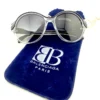 Balenciaga BAL0103 S clear frame sunglasses with black accents and round gradient lenses with pouch