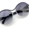 Balenciaga BAL0103 S clear frame sunglasses with black accents and round gradient lenses with pouch
