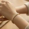 Gold over sterling silver bracelet with cubic zirconia stones panther link design 7 inch