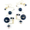 Modernist geometric dangle earrings in gold filled wire with black glass beads sculptural design